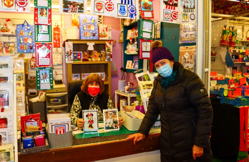 Jo Gideon MP meets June who runs a card shop in Stoke Indoor Market