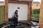 Jo visits homes which have been affected by the marl hole